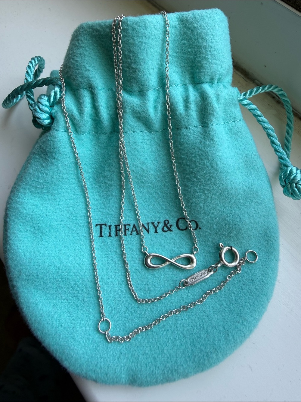 Tiffany & Co. Silver Infinity Pendant Necklace with Tiffany Blue Pouch